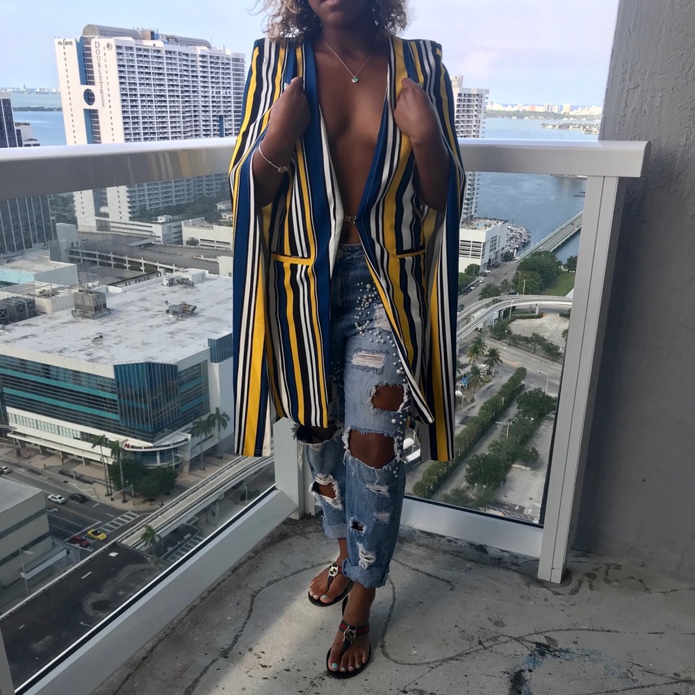Stripped vest with cape